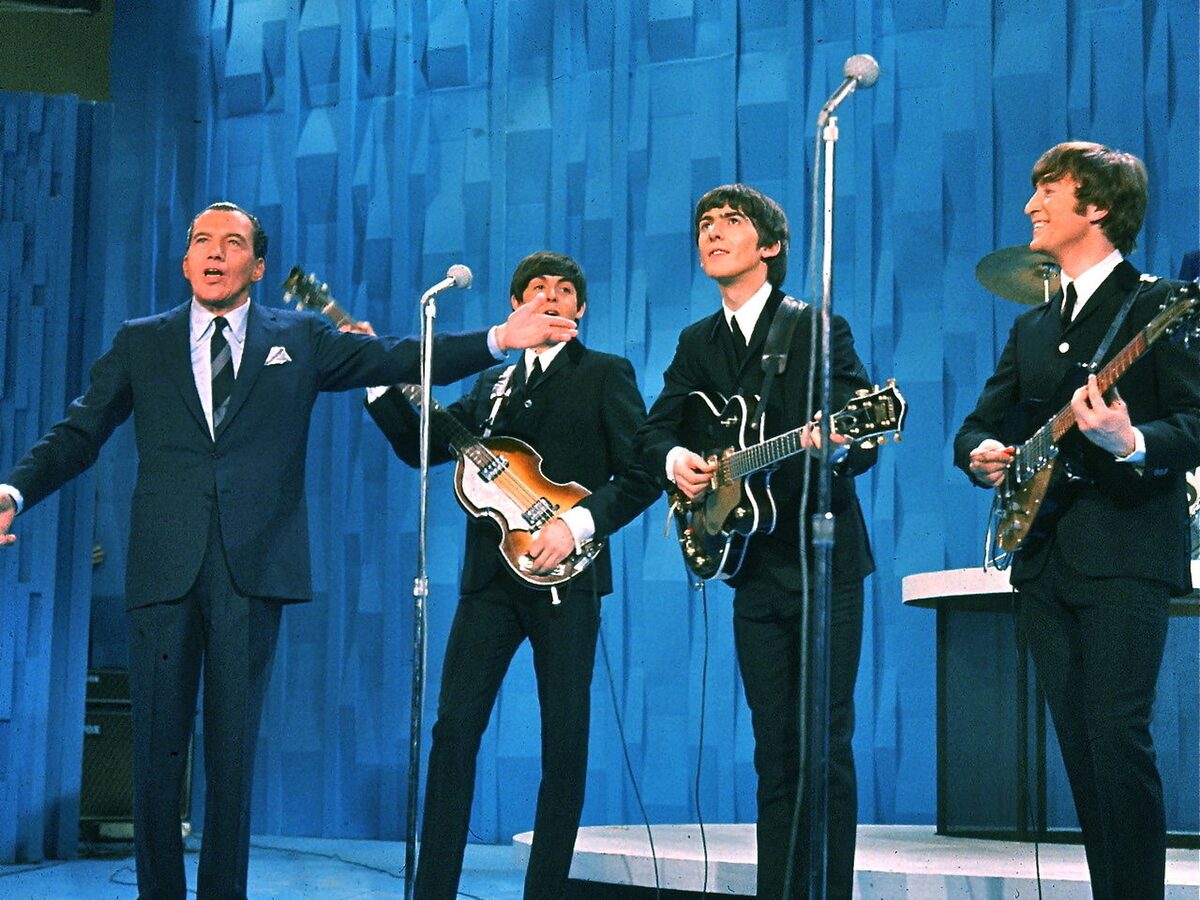 Ed Sullivan introducing The Beatles on his television show