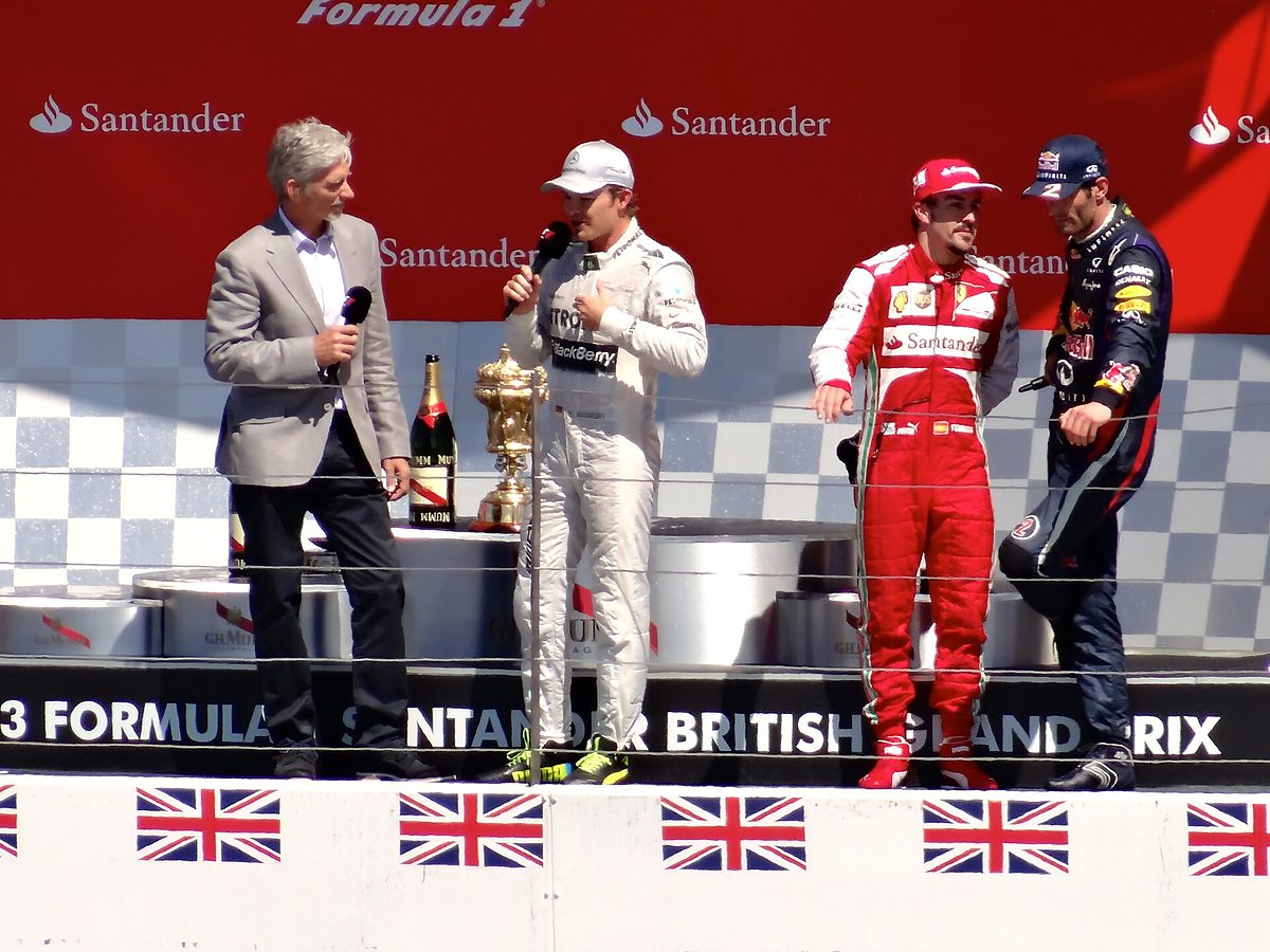 Formula 1 drivers celebrating on the British Grand Prix podium