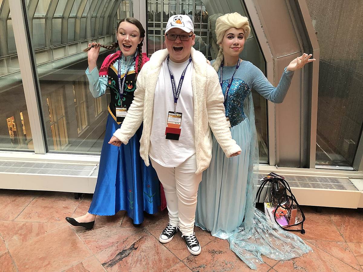 Fans dressed as Frozen characters Elsa, Anna, Kristoff and Hans