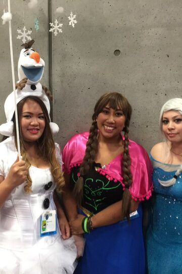Costumed characters from Disney's Frozen including Anna, Elsa, Olaf and Kristoff