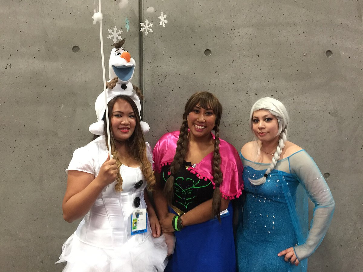 Costumed characters from Disney's Frozen including Anna, Elsa, Olaf and Kristoff