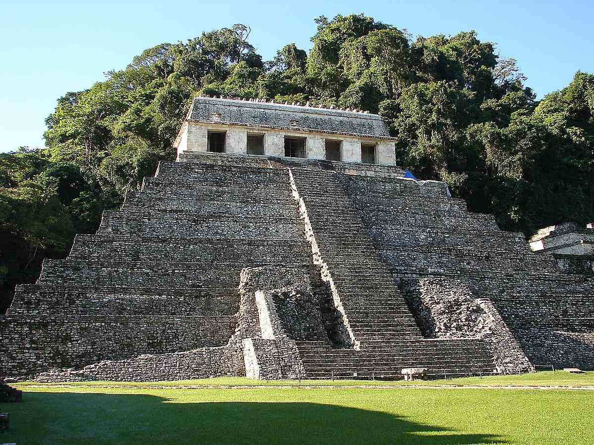 Temple of the Inscriptions rising above the forest at the Maya city of Palenque