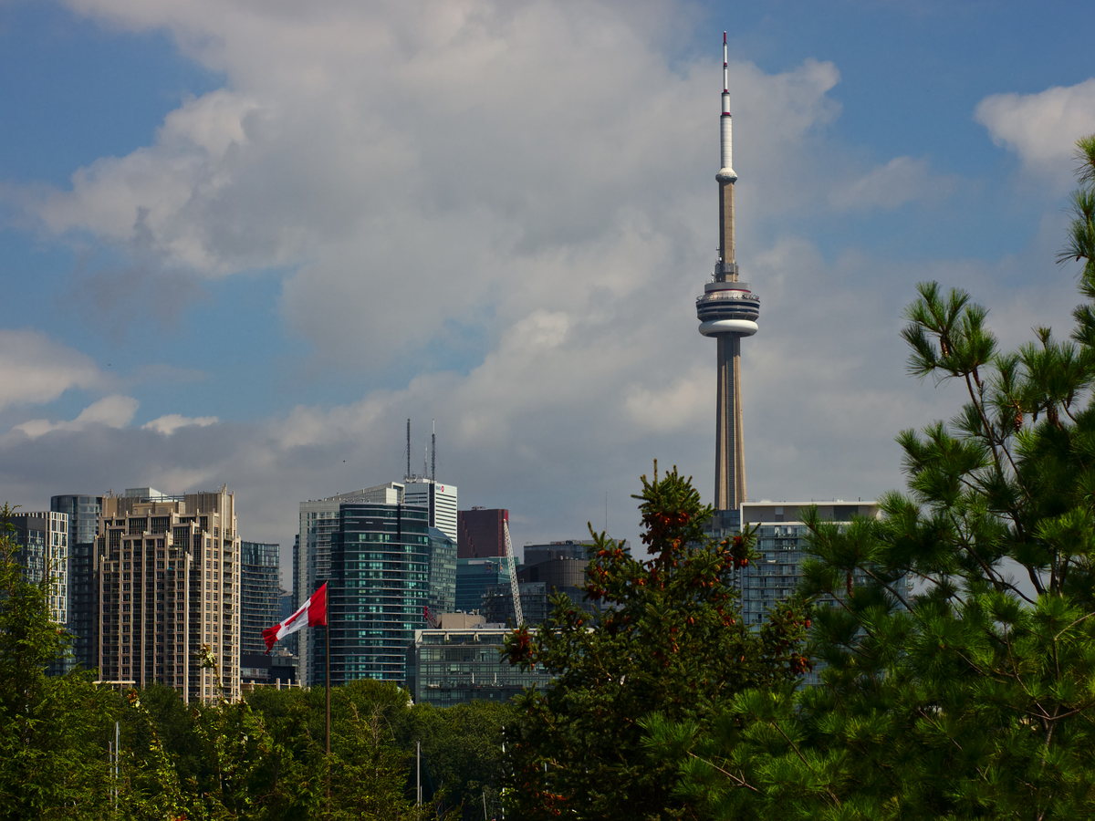 Toronto skyline with the CN Tower and a Canadian flag