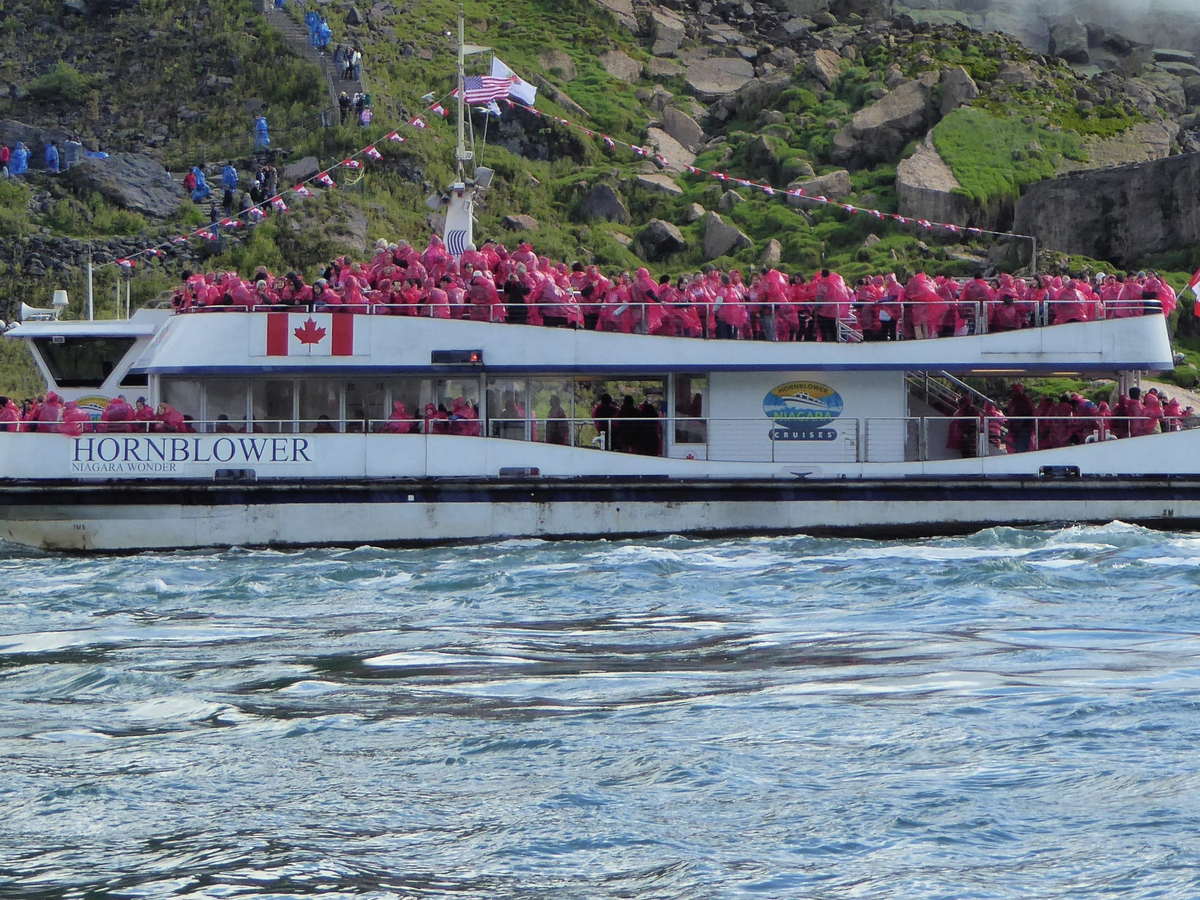 Niagara Falls sightseeing boat carrying visitors on the Niagara River in Ontario