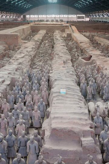 Ranks of terracotta warriors in an excavated burial pit in Xi'an