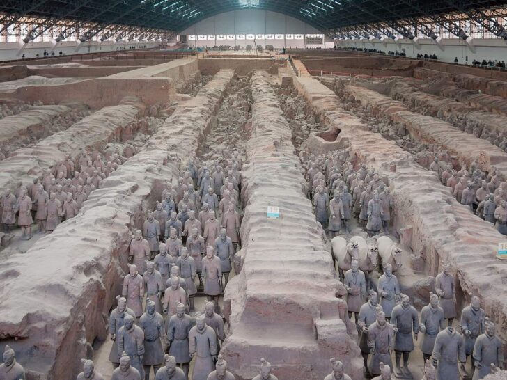 Ranks of terracotta warriors in an excavated burial pit in Xi'an