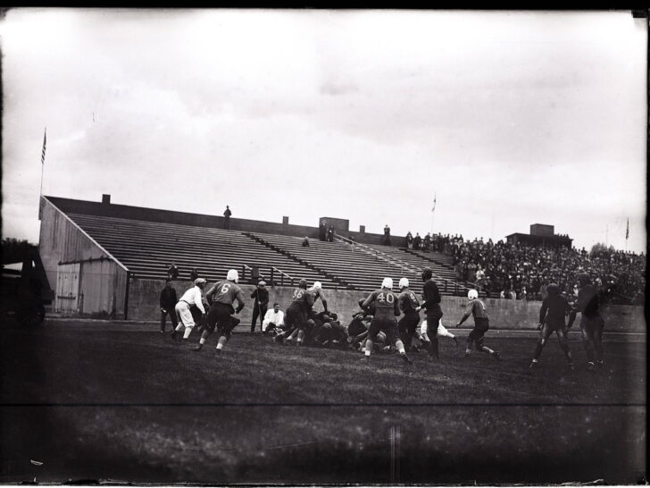 Historic black-and-white photograph of an Aggies versus BYU college football game