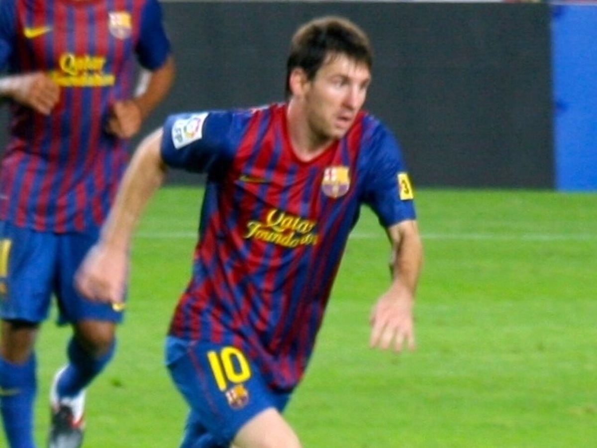 Lionel Messi playing for FC Barcelona in 2011