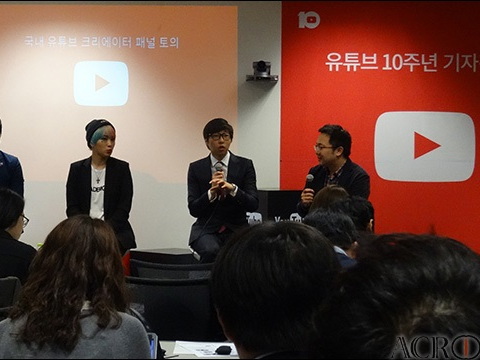 YouTube creators speaking during a panel discussion