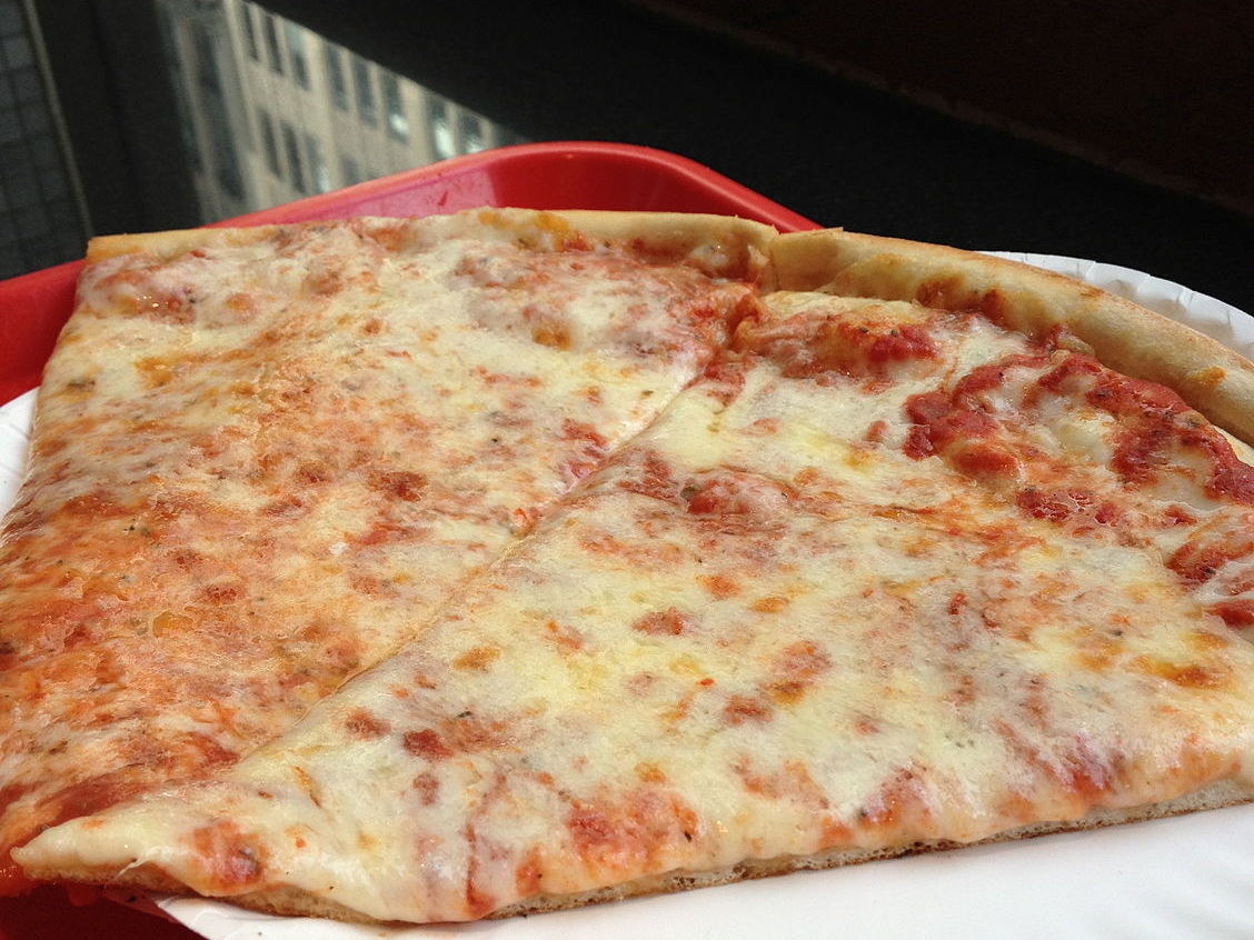 Slices of thin-crust New York-style pizza served to go