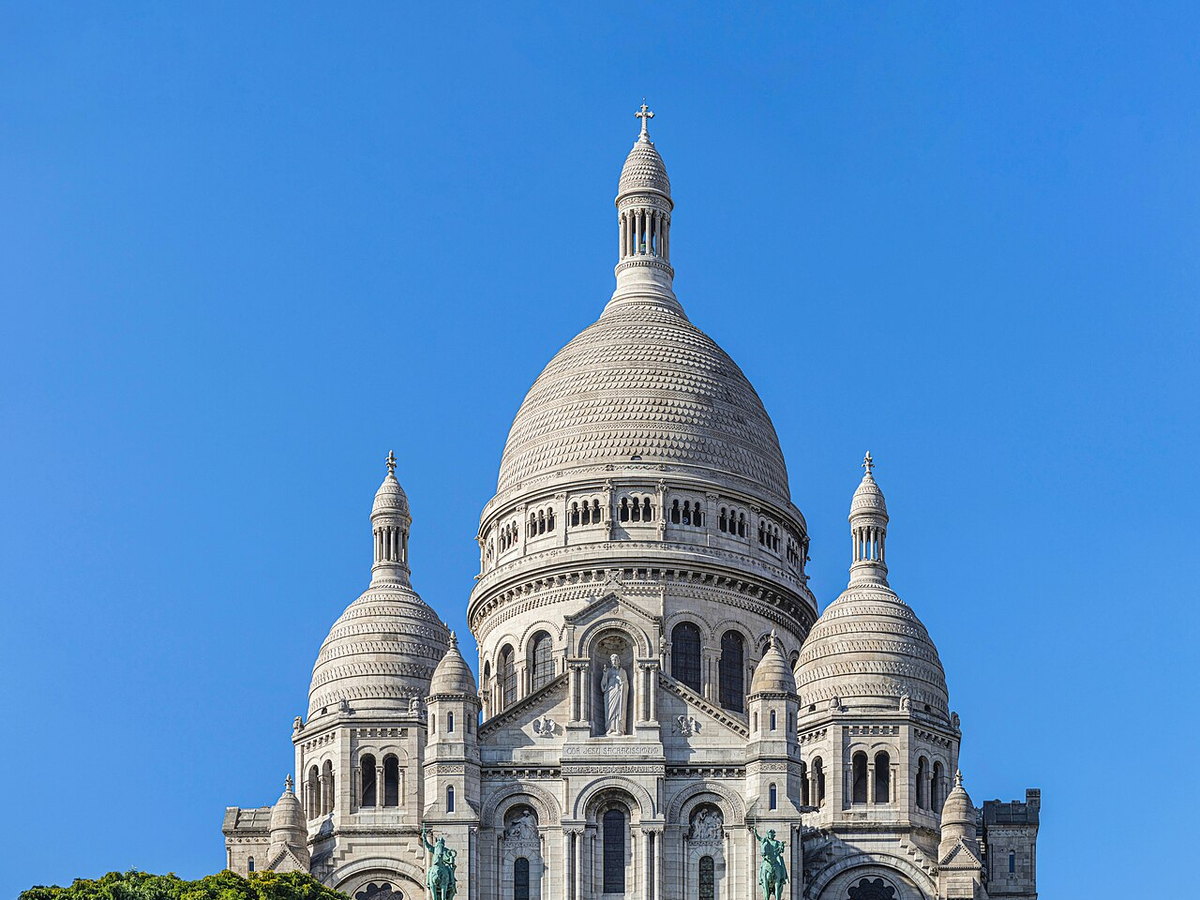 Sacré-Cœur Basilica seen from Square Louise Michel in Montmartre, Paris