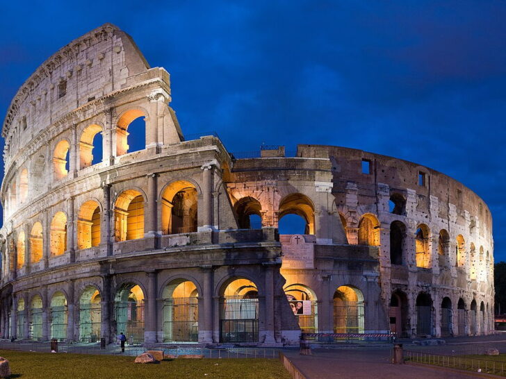 Panoramic view of the Colosseum in Rome at dusk