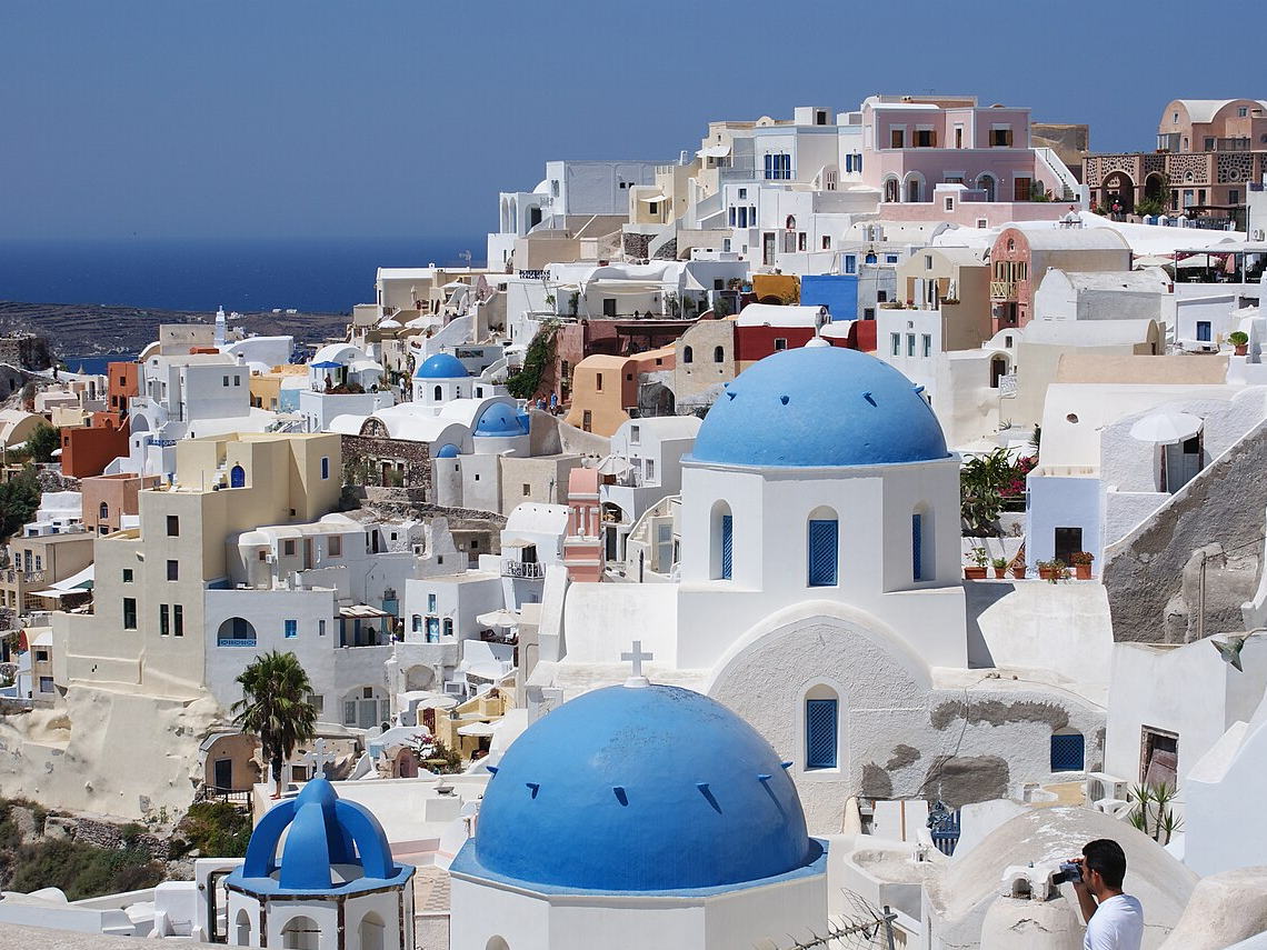 Whitewashed buildings on the cliffs of Oia, Santorini, Greece