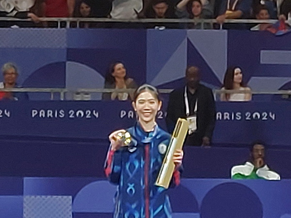 Medalists on the women's 49 kg taekwondo podium at the Paris 2024 Olympics