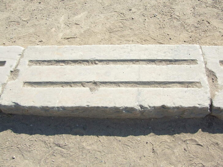 The stone starting line in the ancient stadium at Olympia, Greece