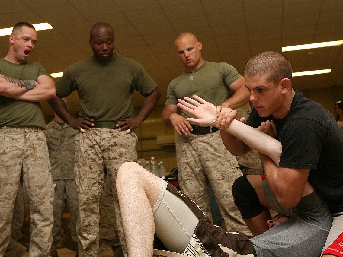 UFC fighter Joe Lauzon demonstrating a grappling technique at Camp Ramadi in 2008