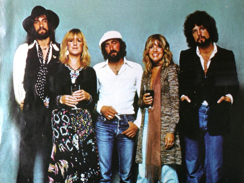 Fleetwood Mac members posed together for a 1977 Billboard photograph