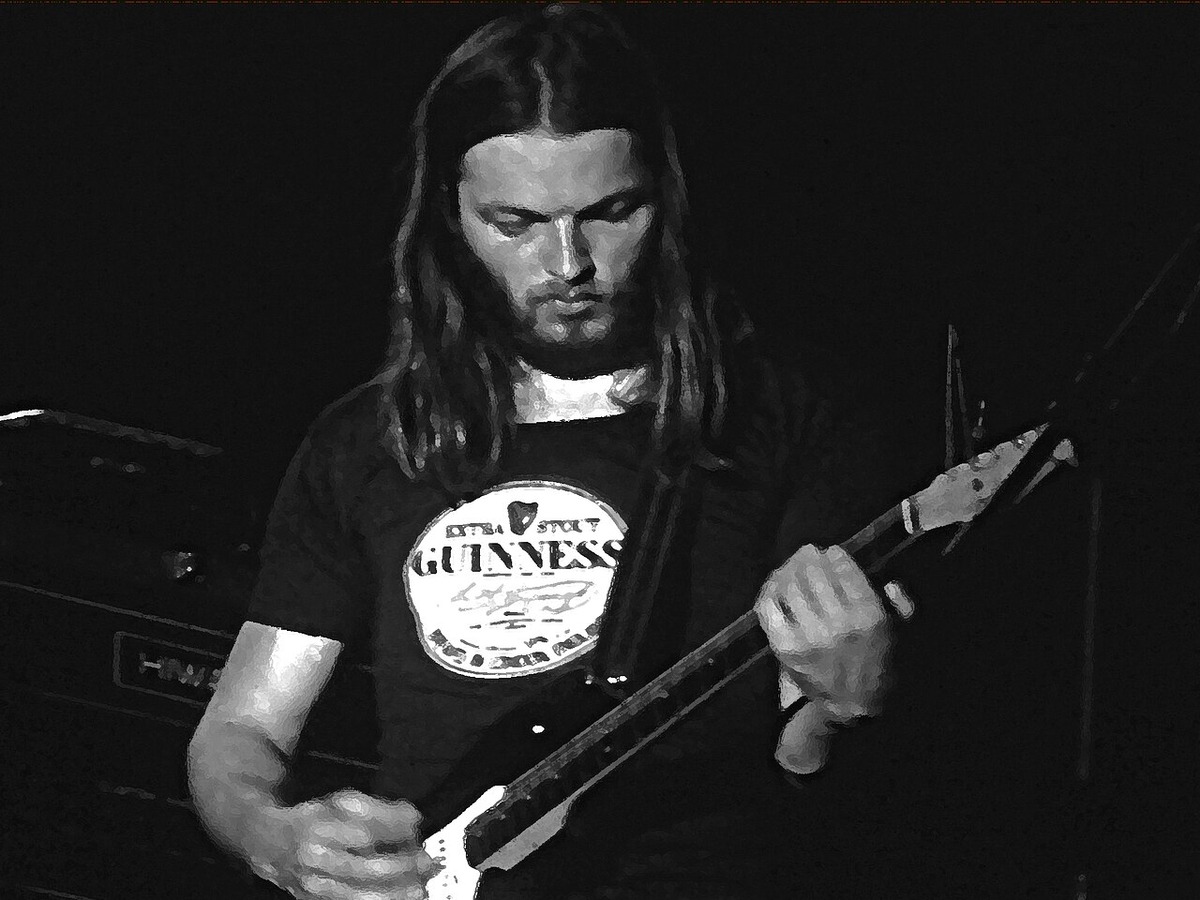 Pink Floyd guitarist David Gilmour playing a Stratocaster onstage