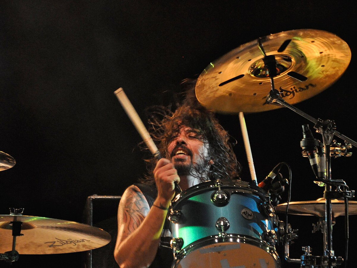 Nirvana drummer Dave Grohl playing a drum kit onstage