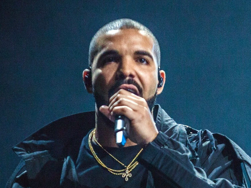 Drake performing live onstage in July 2016