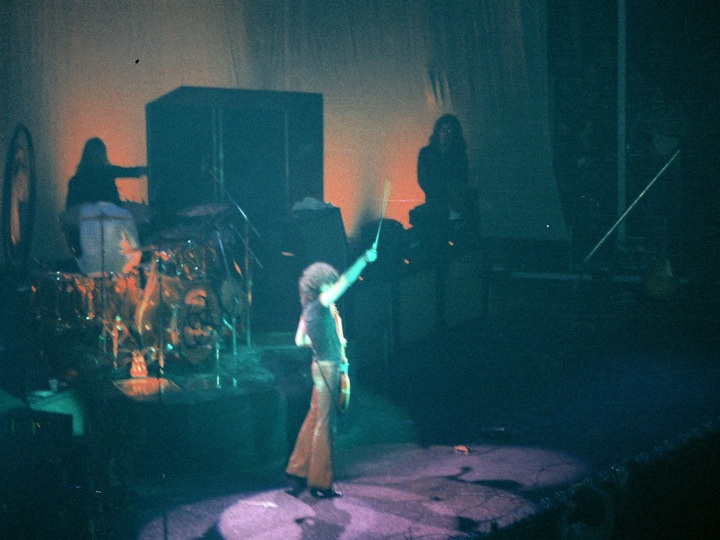 Led Zeppelin guitarist Jimmy Page playing guitar with a violin bow