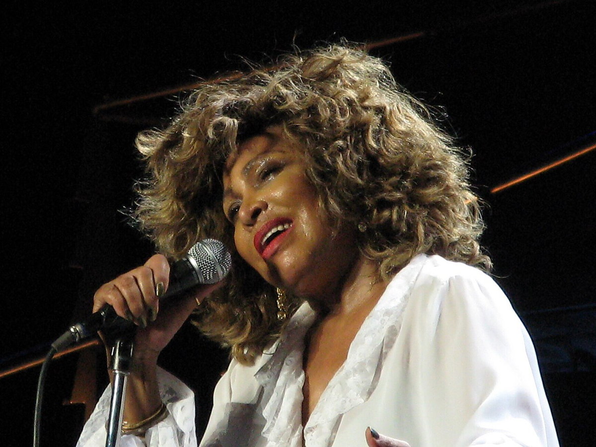 Tina Turner performing onstage during her 50th Anniversary Tour