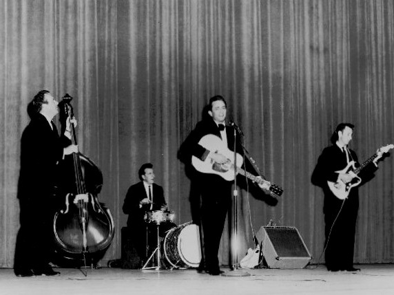Johnny Cash performing with the Tennessee Three in 1963