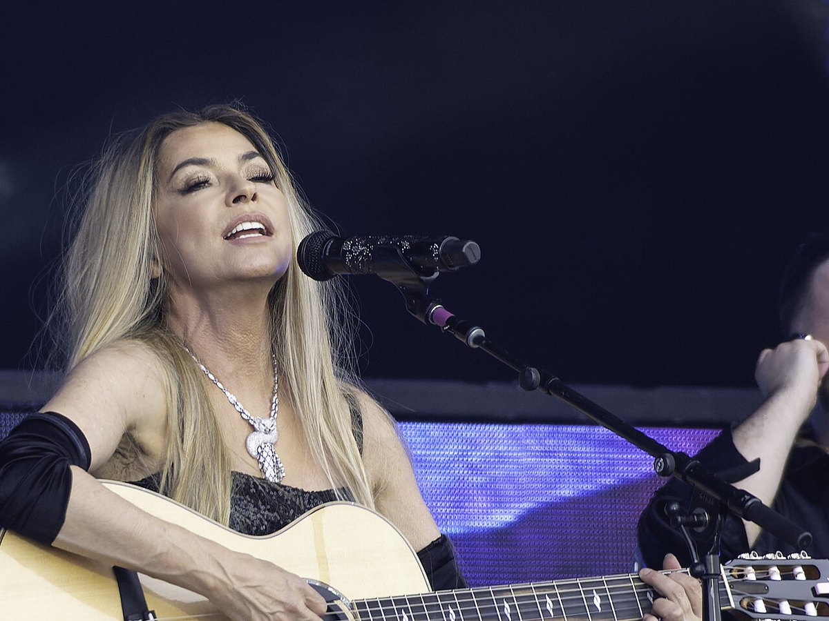 Shania Twain performing onstage at Glastonbury Festival in 2024