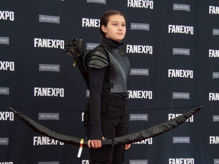 Katniss Everdeen cosplay with a bow inspired by The Hunger Games