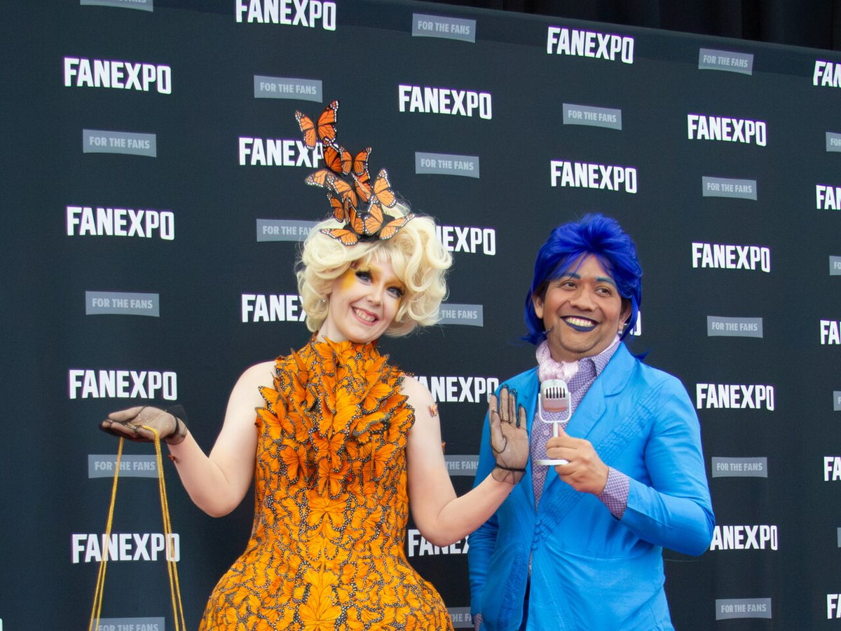 Effie Trinket and Caesar Flickerman cosplay inspired by The Hunger Games