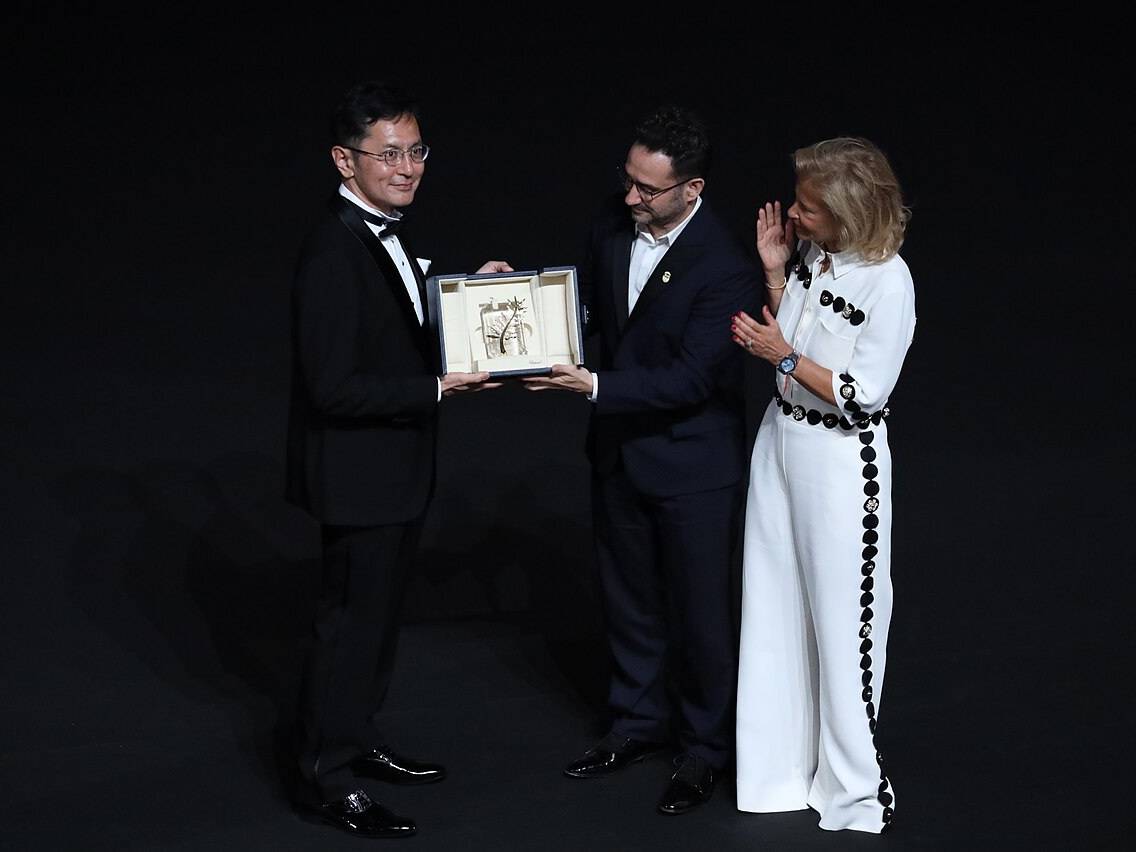 Goro Miyazaki accepting Studio Ghibli's honorary Palme d'Or at Cannes in 2024