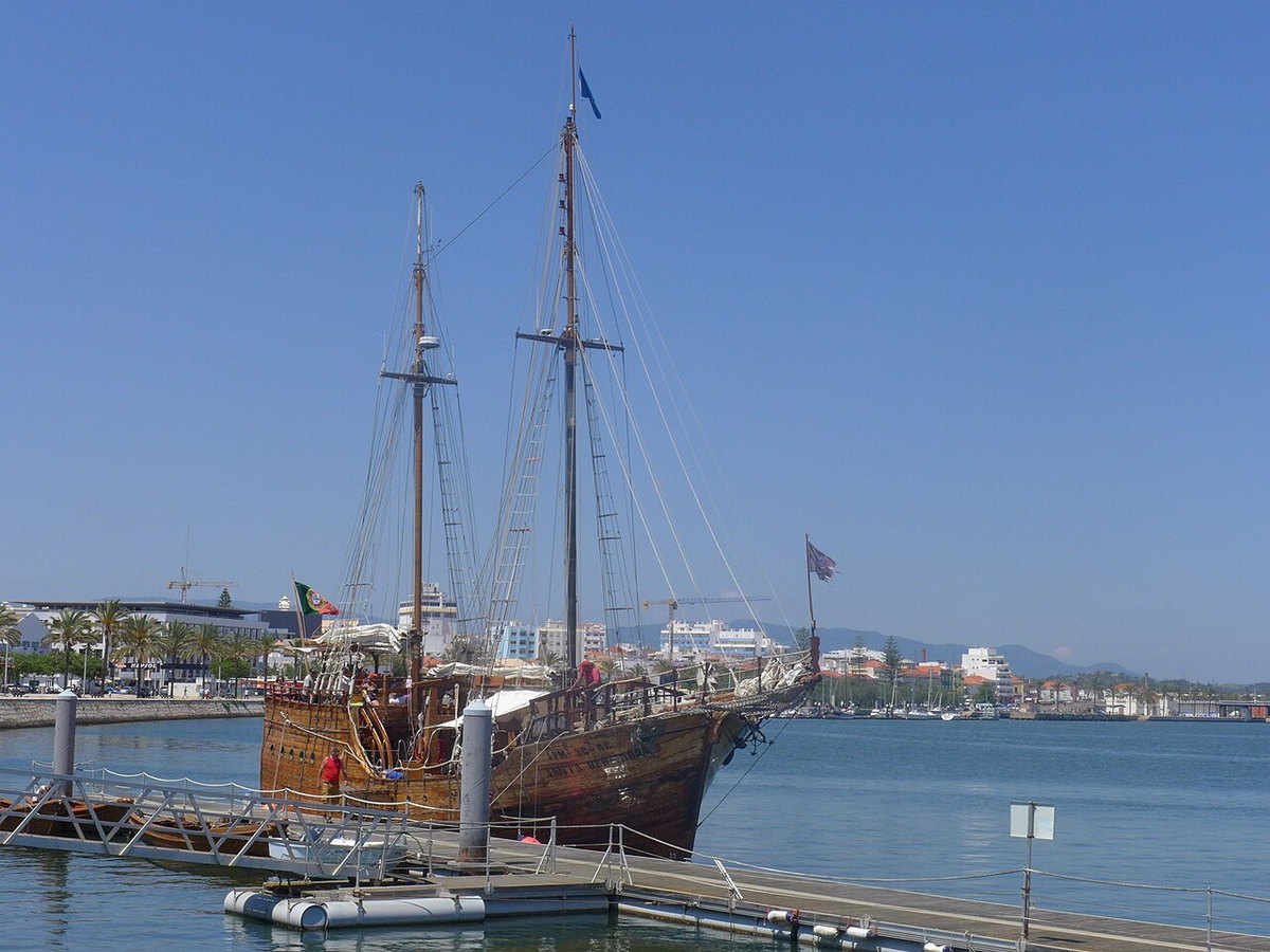 Replica of a 15th- and 16th-century Portuguese caravel sailing near Portimao, Portugal