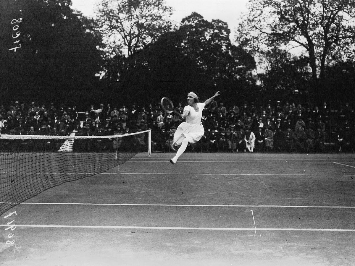 Historic photograph of Suzanne Lenglen playing tennis in 1920