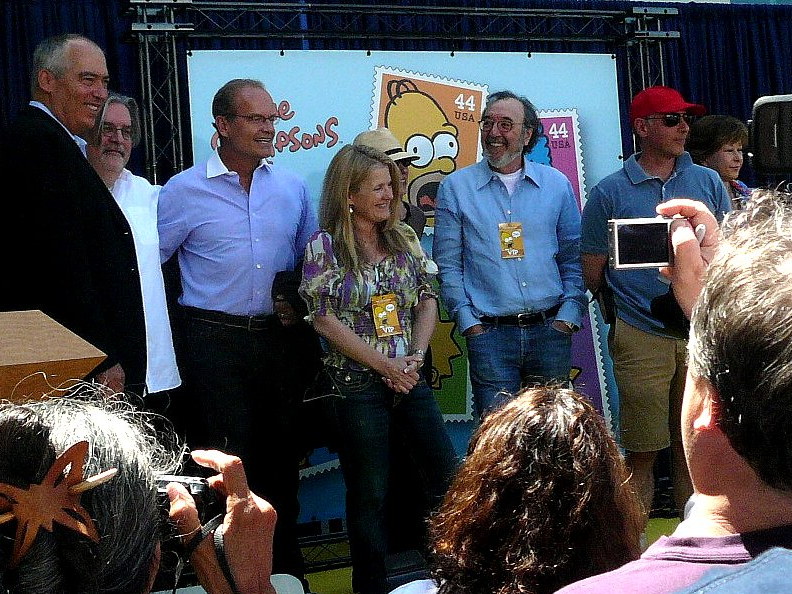 The Simpsons cast and crew gathered at a 2009 stamp unveiling in Los Angeles