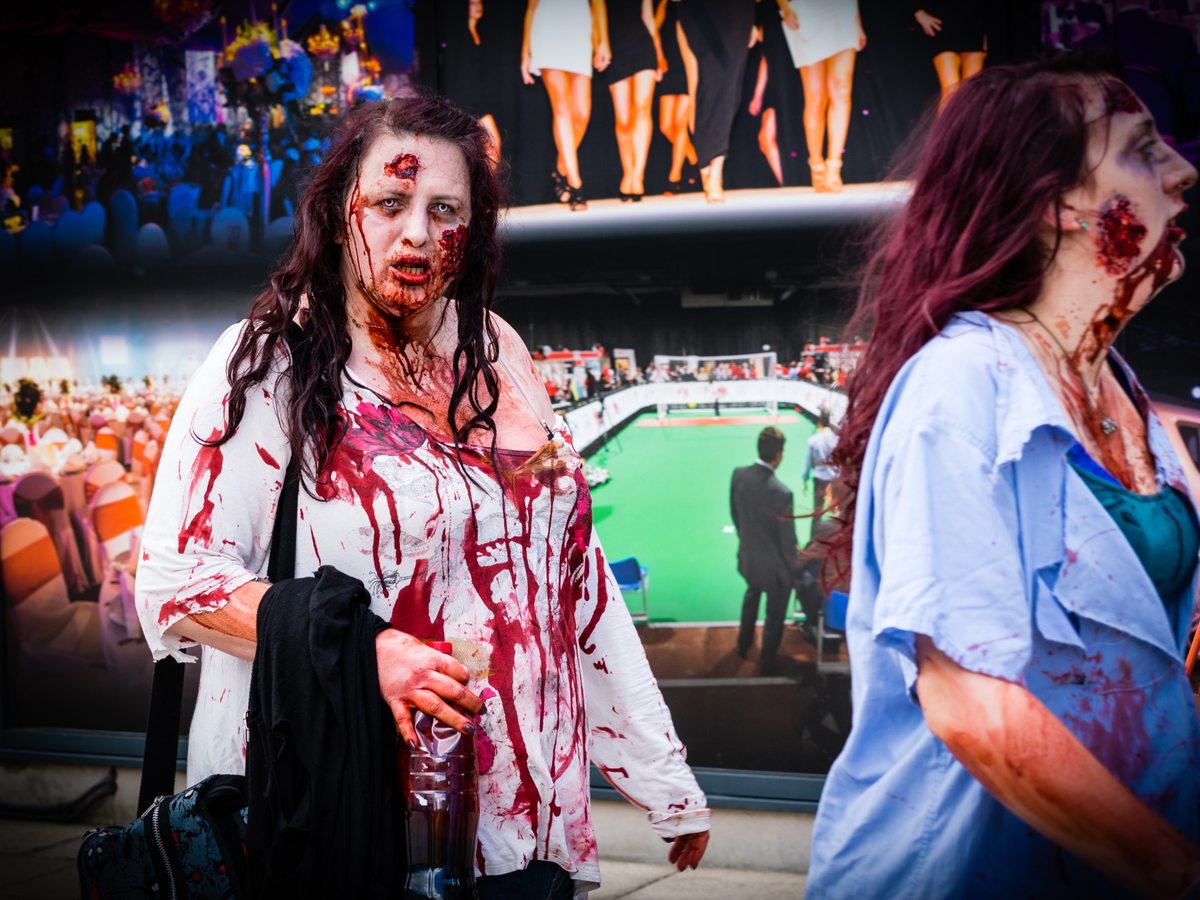 The Walking Dead cosplayers in detailed survivor costumes