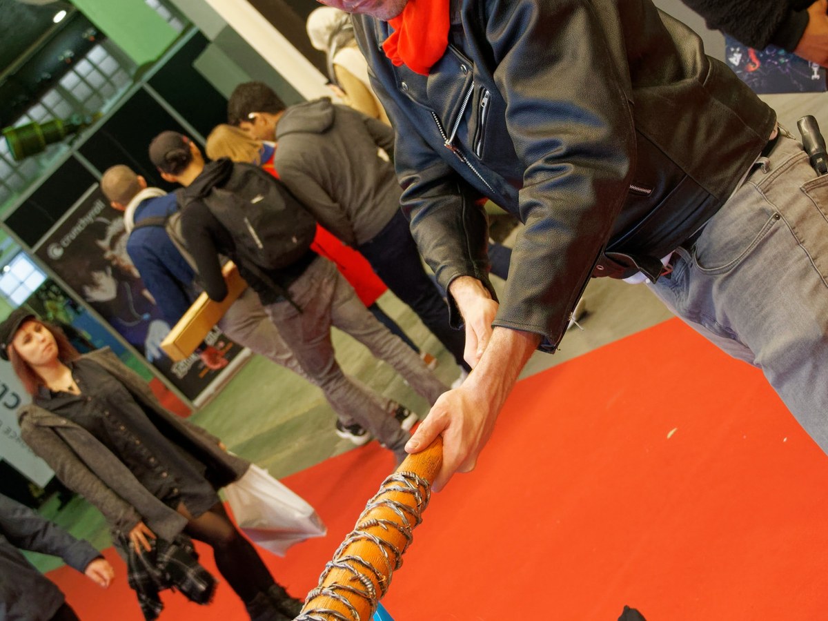 Negan cosplayer with a barbed-wire baseball bat
