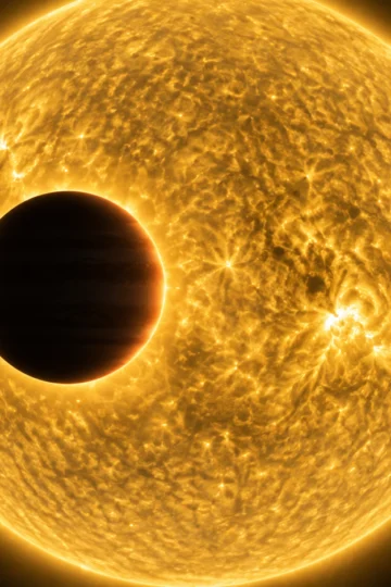 A hot Jupiter crosses the glowing face of its host star
