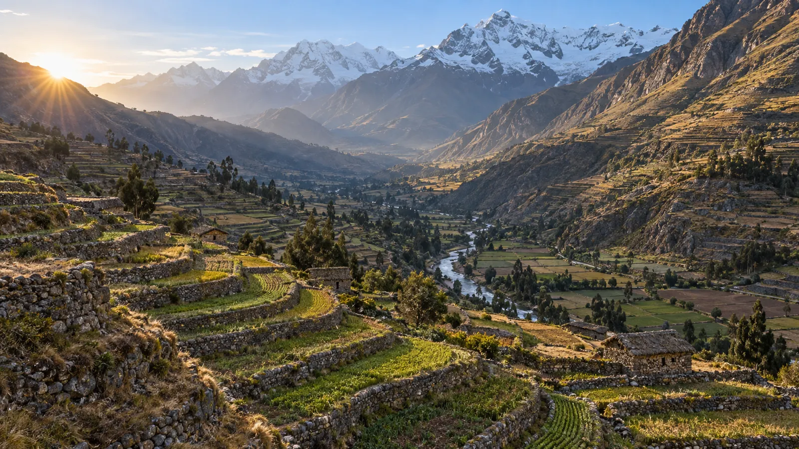 Agricultural terraces descending through a high Andean mountain valley