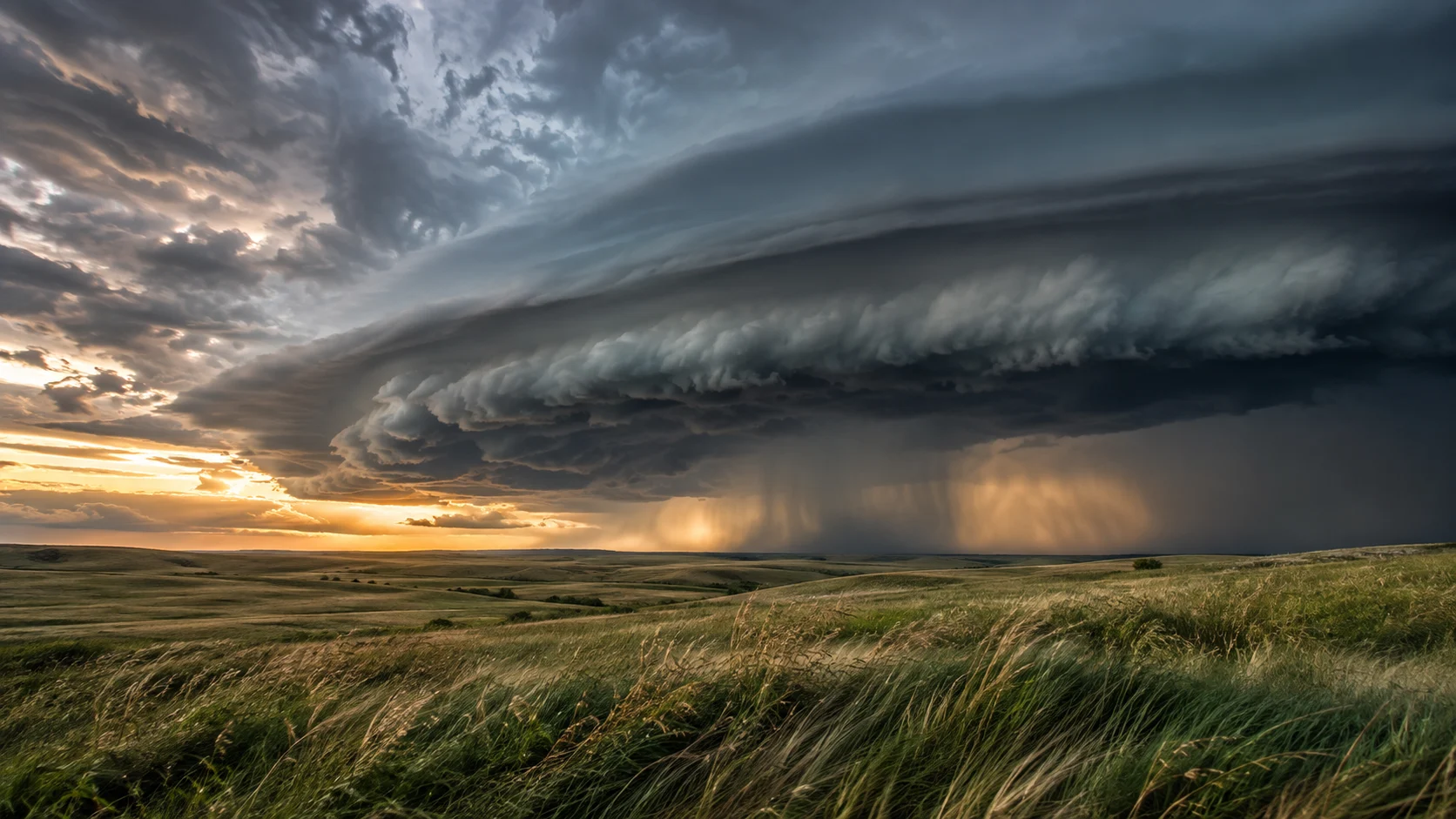 Massive shelf cloud crossing open prairie