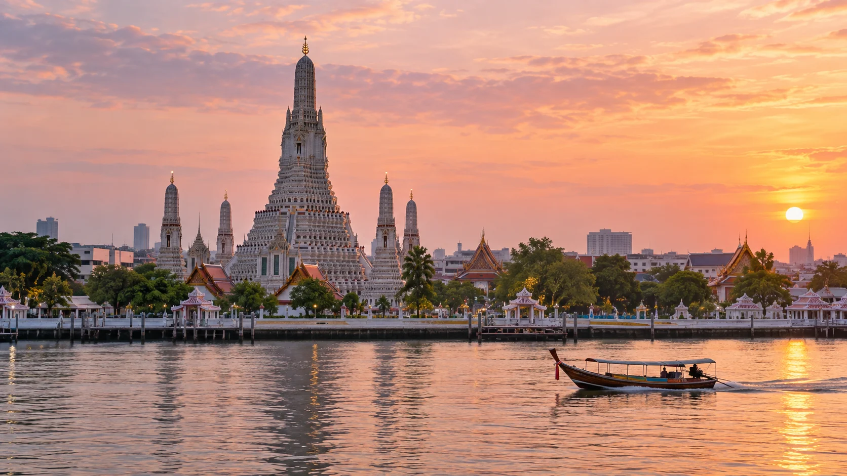 Wat Arun beside Bangkok's Chao Phraya River at sunrise